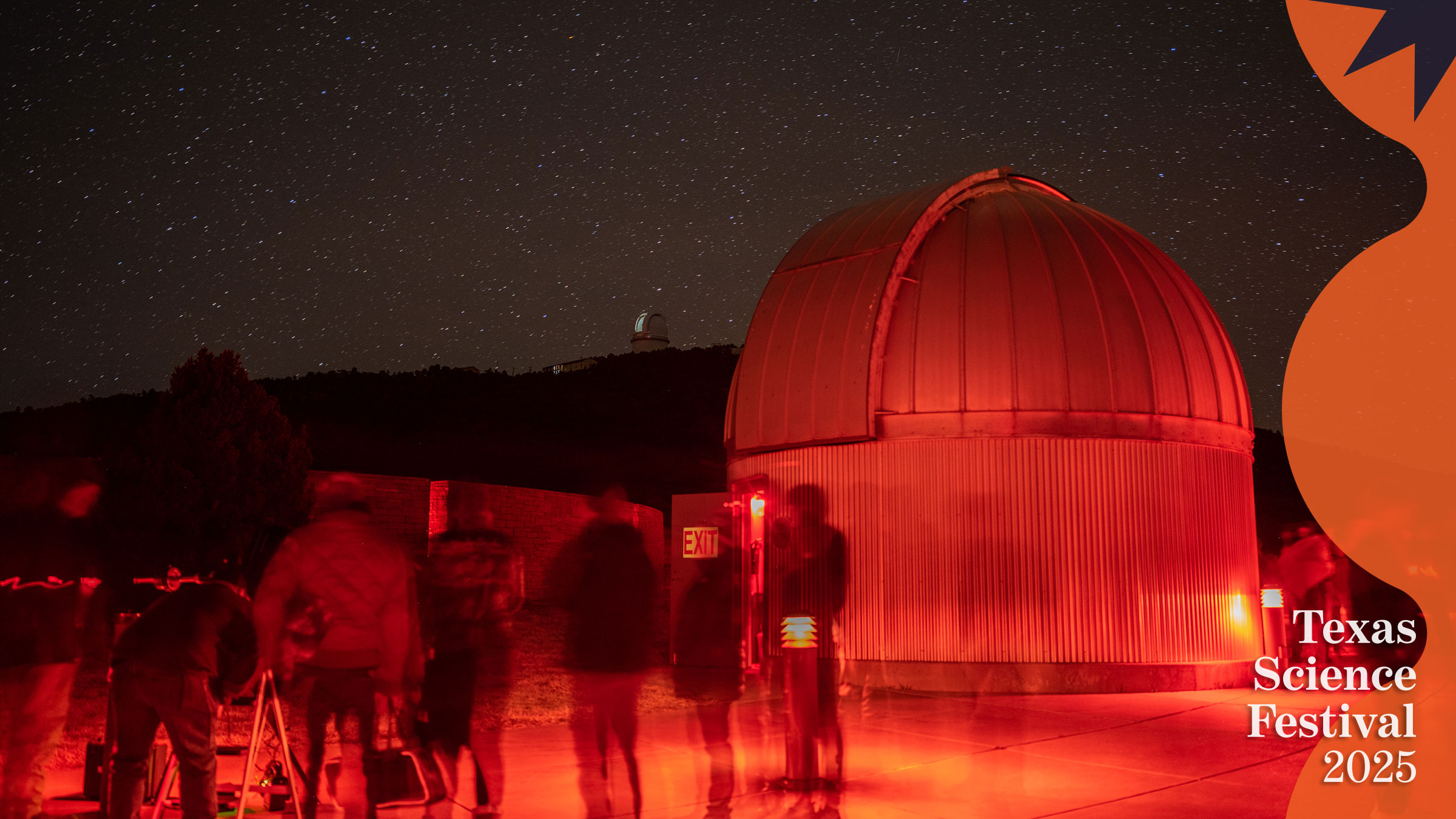 People at a night event at McDonald Observatory