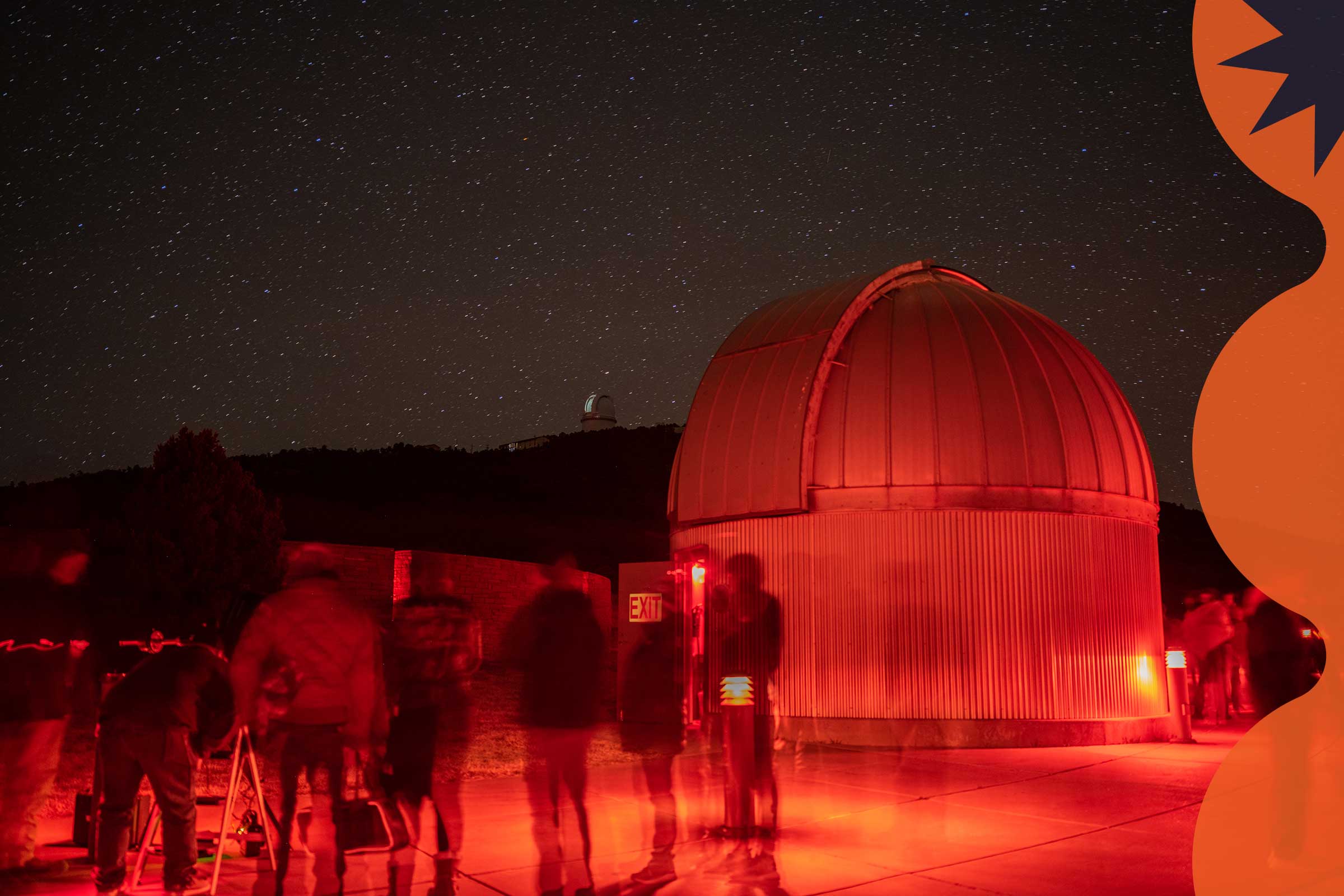 People at a night event at McDonald Observatory